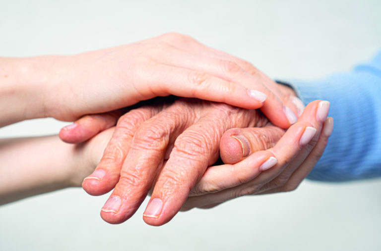 young,hands,hold,old,hands.,support,for,the,elderly,concept.